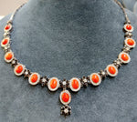 18ct white gold necklace weighing 19.40 grams with Sardinian coral and diamond (white and black)-cut brillant weighing 6.40 carats G/F vs Single piece