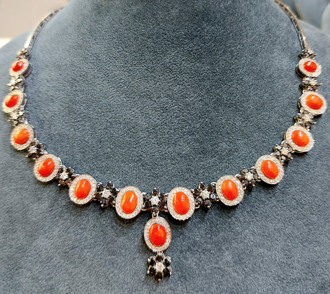 18ct white gold necklace weighing 19.40 grams with Sardinian coral and diamond (white and black)-cut brillant weighing 6.40 carats G/F vs Single piece