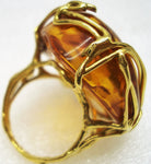 Natural amber set in a stunning 18-karat gold ring